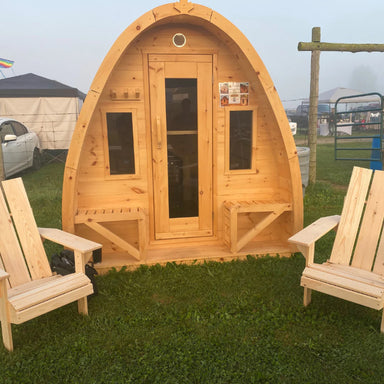 True North Saunas Outdoor Pod Sauna in Campground with Adirondack Chairs