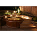 Northern Lights Classic Cedar Hot Tub on Backyard Patio with beautiful landscape lighting