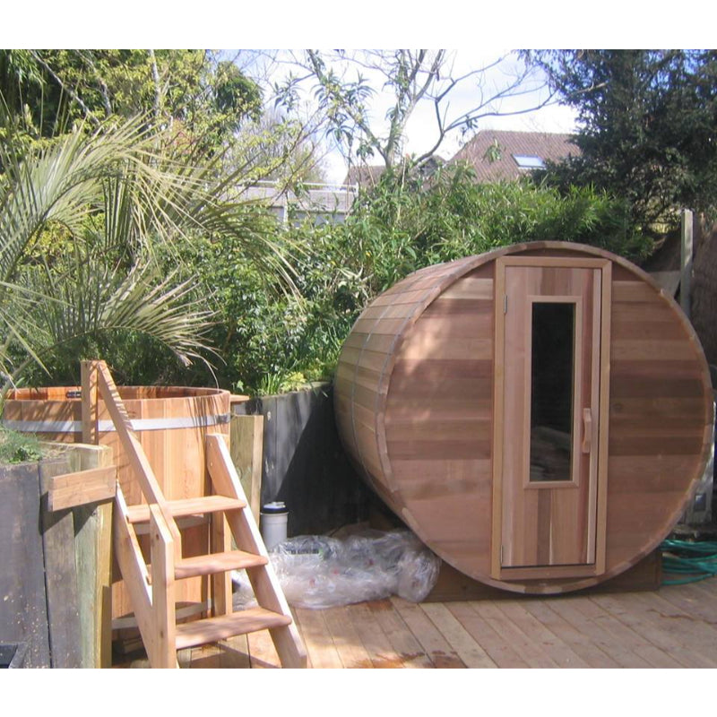 Northern Lights Cedar Barrel Sauna and Cedar Hot Tub in beautiful backyard oasis