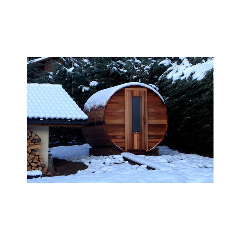 Northern Lights Red Cedar Barrel Sauna in the snow