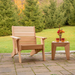 Dundalk Pacific Modern Cedar End Table with Cedar Chair on Backyard Patio