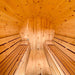 Inside view of True North Saunas Pine Barrel Sauna. No heater installed.